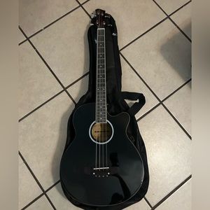 I am selling this YMC acoustic bass guitar. Brand new, never used.